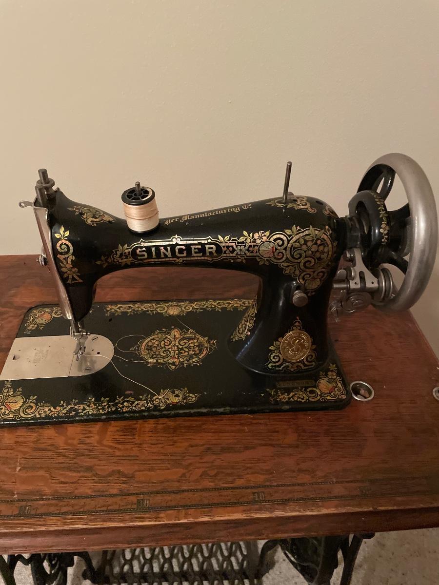 Antique Singer sewing stand with Singer sewing machine