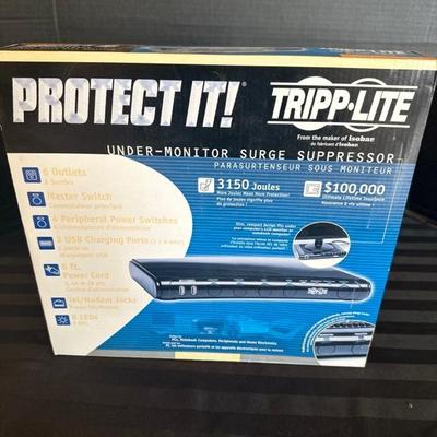 Lot 370 Tripp lite surge protector and Mechanix Wear Gloves