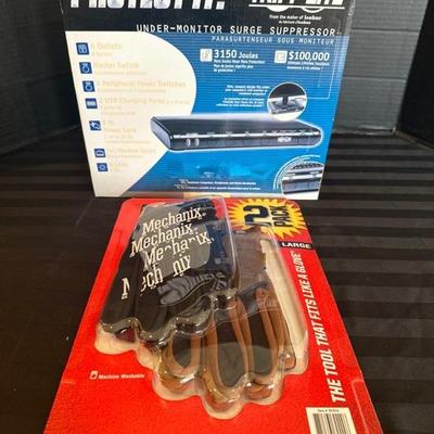 Lot 370 Tripp lite surge protector and Mechanix Wear Gloves