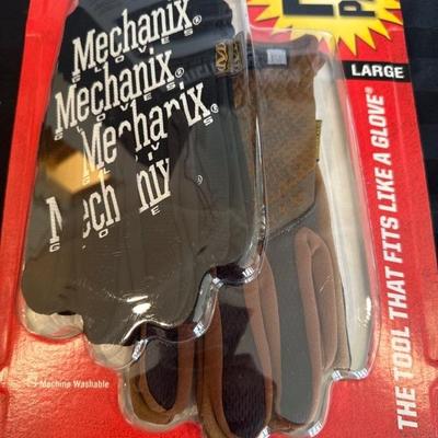 Lot 370 Tripp lite surge protector and Mechanix Wear Gloves