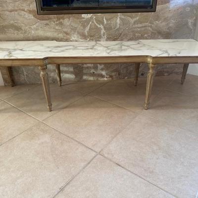 Lot 378 Marble topped, eight legged table