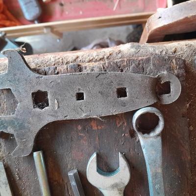 Assortment of wrenches and other hand tools