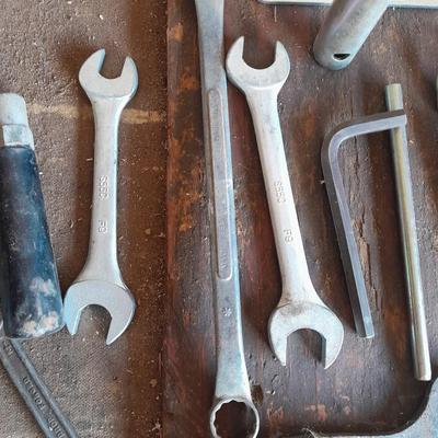 Assortment of wrenches and other hand tools