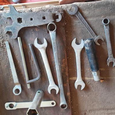 Assortment of wrenches and other hand tools