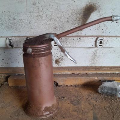 Copper colored oil can