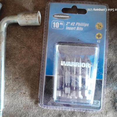 Assortment of hand tools - sockets - driver bits - and more