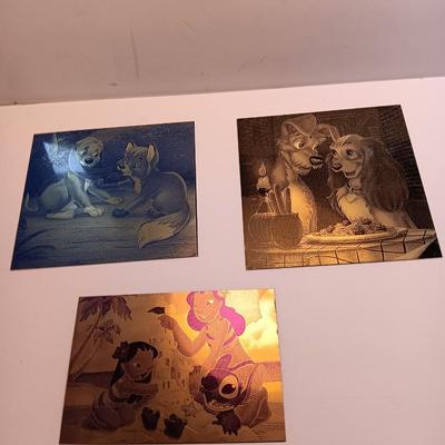 Tin / metal lasered artwork cartoon characters Lady & Tramp - and others