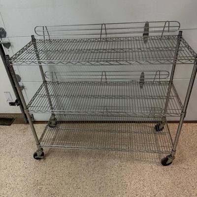 Lot 284 three shelf wire rack on casters