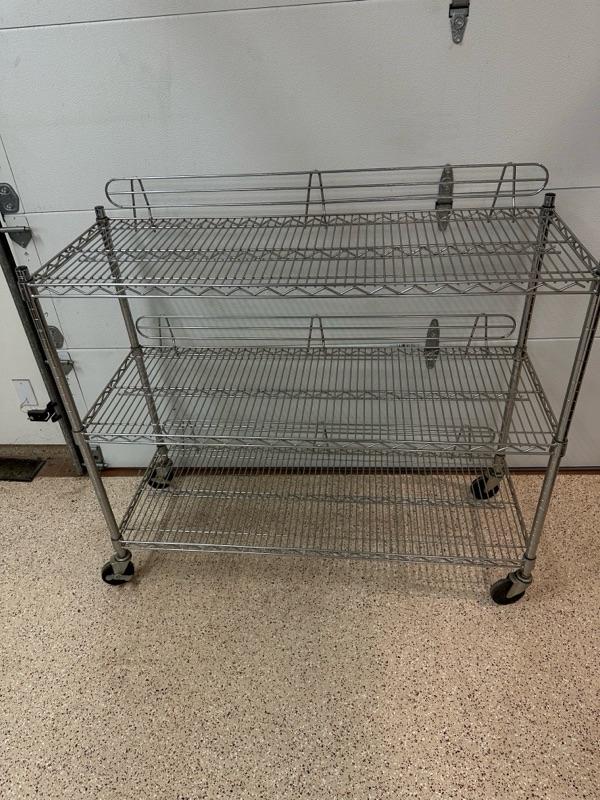 Lot 284 three shelf wire rack on casters