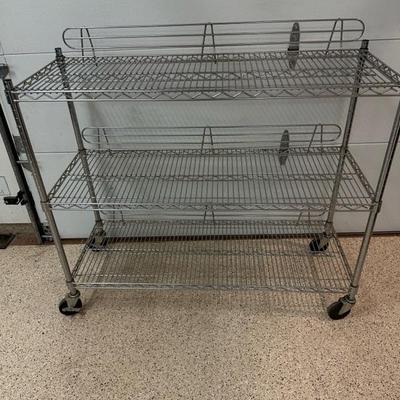 Lot 285 Three shelf wire rack on casters