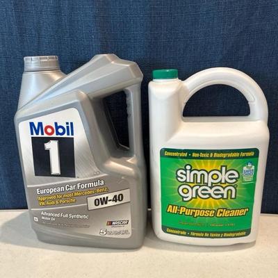 Lot 498 5 quart bottle of motor oil and 140 ounce bottle of simple green