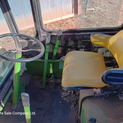 John Deere 830 Windrower swather