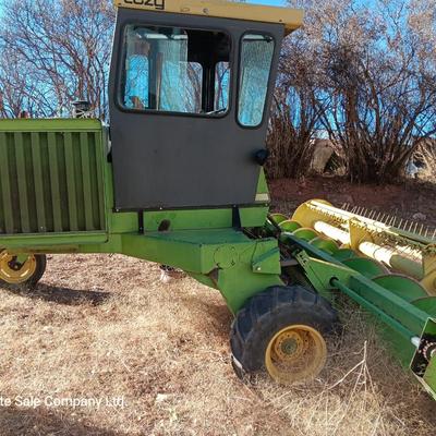 John Deere 830 Windrower swather