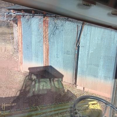 John Deere 830 Windrower swather