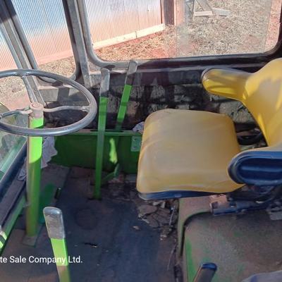 John Deere 830 Windrower swather