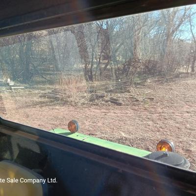 John Deere 830 Windrower swather