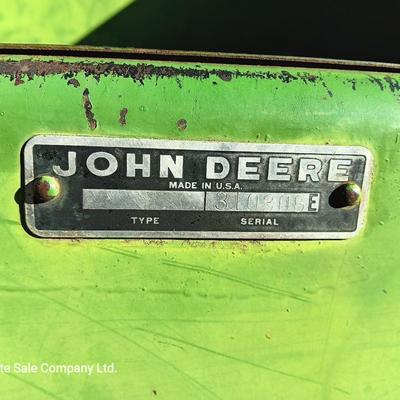 John Deere 830 Windrower swather