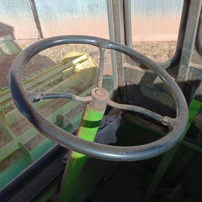 John Deere 830 Windrower swather