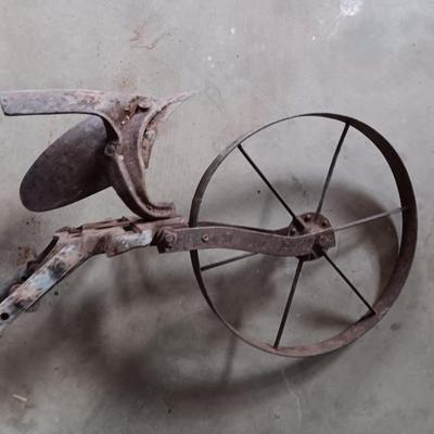 Antique hand plow for yard / garden art
