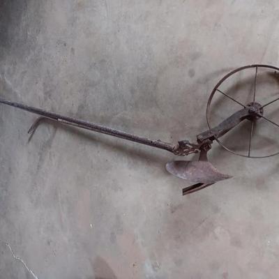 Antique hand plow for yard / garden art