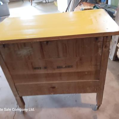Antique cabinet with drawer and storage Framica top