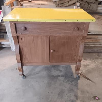 Antique cabinet with drawer and storage Framica top