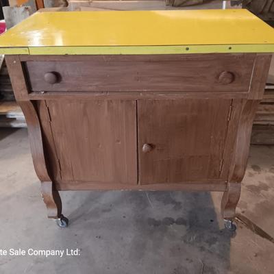 Antique cabinet with drawer and storage Framica top