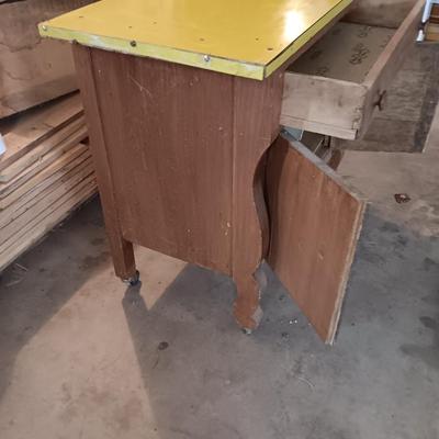 Antique cabinet with drawer and storage Framica top