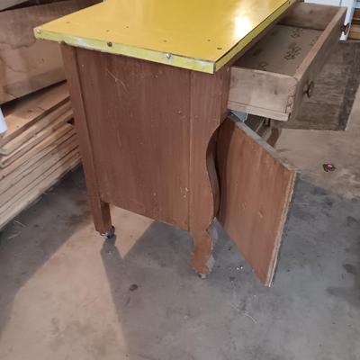 Antique cabinet with drawer and storage Framica top