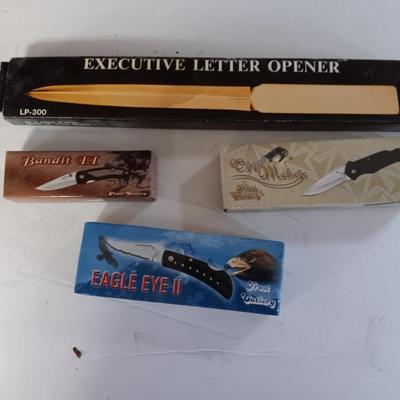 Three new pocketknives and a new executive letter opener