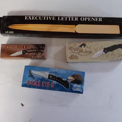 Three new pocketknives and a new executive letter opener