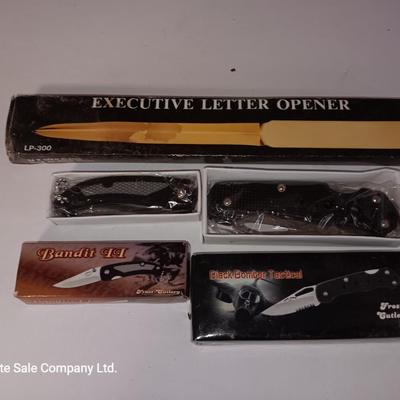 Two new pocketknives and an Executive letter opener