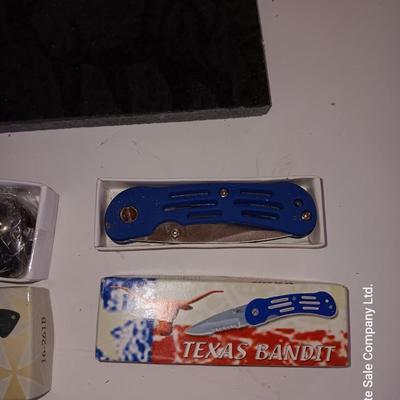 Lasered art tile with Elk and two new pocketknives