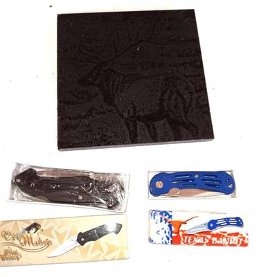 Lasered art tile with Elk and two new pocketknives