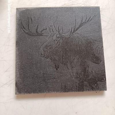 Three new pocketknives and a lasered art tile of a Moose