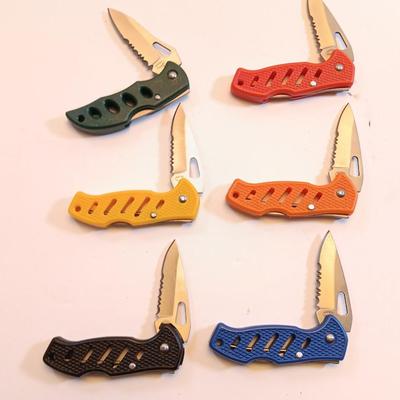 Six pocketknives each a different color