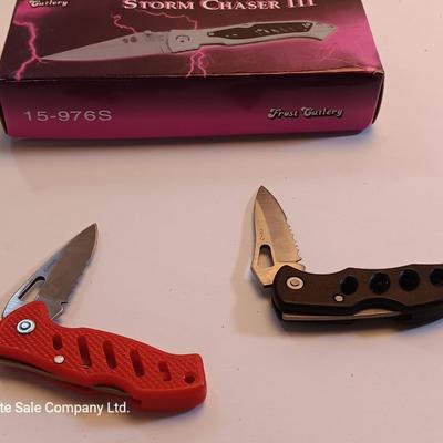 Three new Pocketknives Storm chaser II with case and two smaller ones