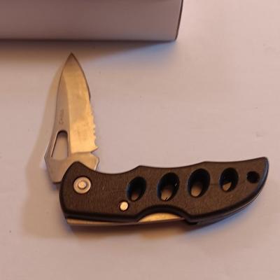Three new Pocketknives Storm chaser II with case and two smaller ones
