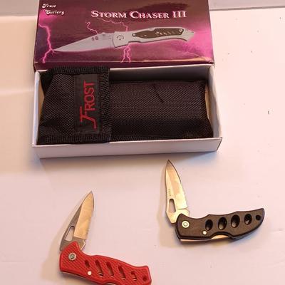Three new Pocketknives Storm chaser II with case and two smaller ones