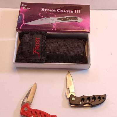 Three new Pocketknives Storm chaser II with case and two smaller ones