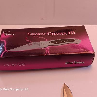 Three new Pocketknives Storm chaser II with case and two smaller ones