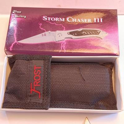 Three new Pocketknives Storm chaser II with case and two smaller ones