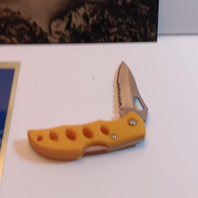 Three laser art tin / metal elk - squirrel - and Polar bear with two pocketknives