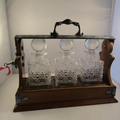 Antique Tantalus- Three Bottle Decanter Set