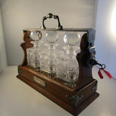 Antique Tantalus- Three Bottle Decanter Set