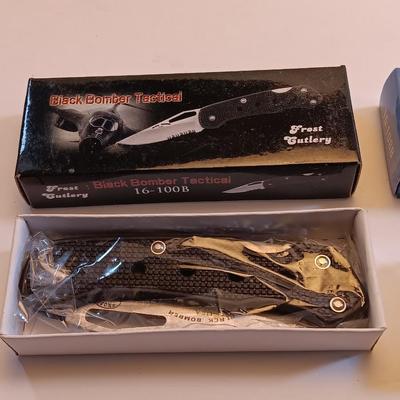 Two brand new pocketknives Eagle eye II and Black bomber tactical Frost cutlery