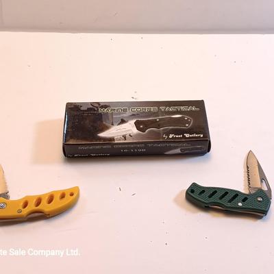 Three Frost Cutlery pocketknives - Marine Corps Tactical and two smaller ones