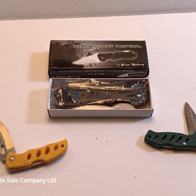 Three Frost Cutlery pocketknives - Marine Corps Tactical and two smaller ones