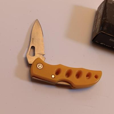 Three Frost Cutlery pocketknives - Marine Corps Tactical and two smaller ones