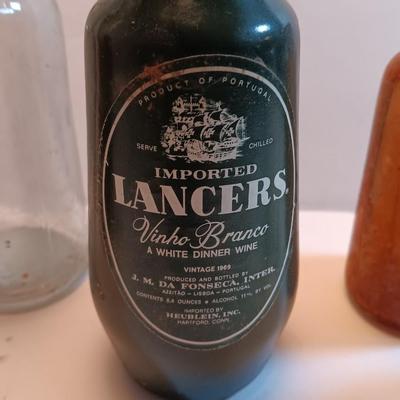 Vintage glass bottles and crock like bottles